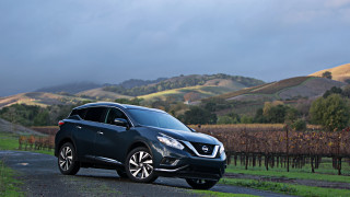 Black car vineyard hill cloudy - 8k photorealistic free wallpaper