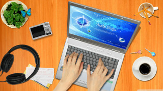 Person typing laptop coffee headphones - free technology wallpaper