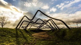 Metal sculpture grassy field cloudy - sculpture free wallpaper for desktop