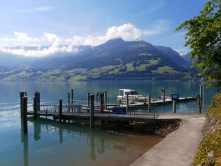 Lake mountains boat pier sky - a pier free wallpaper for desktop