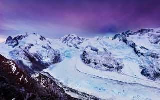 Snowy mountain range purple sky - free winter wallpaper