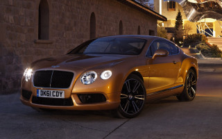 Golden bentley night lights cooper - the front of the car free wallpaper for desktop