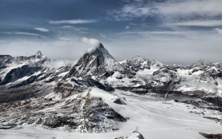 Snowy mountains cloudy horizon beach - andreas gursky free wallpaper