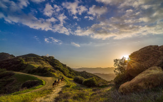 Horse riders mountain sunset landscape - a group of people riding free wallpaper for desktop
