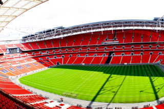 Stadium green field red seats 4 - a stadium free wallpaper