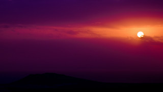 Sunset plane mountains mystical colors - a plane free wallpaper for desktop
