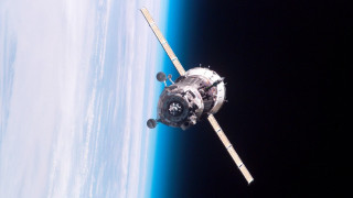 Satellite earth blue background white - free space wallpaper