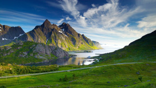 Mountain lake road bush clouds - a scenic view of a mountain range free wallpaper