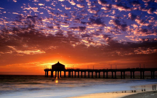 Sunset pier clouds water cityscape - a pier free wallpaper for desktop