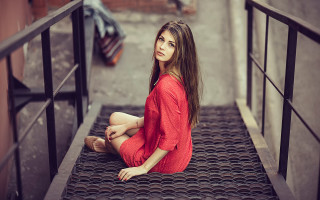 Woman reddress staircase serious portrait - a stair case free wallpaper