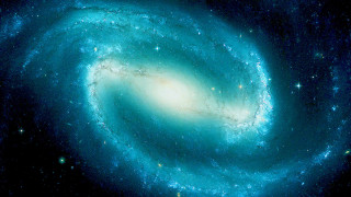 Galaxy stars background 1980s style - a spiral galaxy free wallpaper