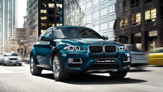 Blue bmw suv city night 2 - tall free wallpaper