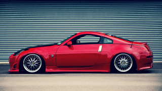 Red sports car garage roller 2 - a garage door free wallpaper