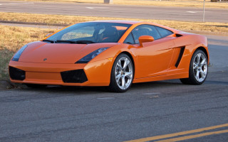 Bright orange sports car roadside - orange sports car free wallpaper