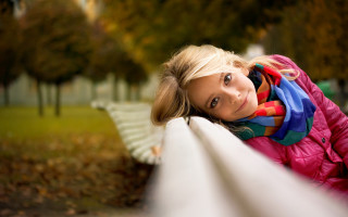 Woman park leaning white rail - free autumn wallpaper