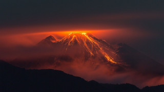 Mountain peak bright light clouds - apocalyptic free wallpaper