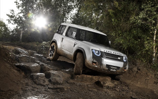 Silver land rover muddy woods - a bright sun free wallpaper