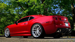 Red sports car parking lot 72 - a red sports car free wallpaper