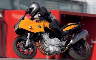 Yellow motorcycle man street red - a yellow motorcycle free wallpaper