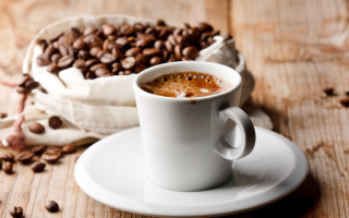 Coffee saucer coffee beans wooden - a pile of coffee beans free wallpaper
