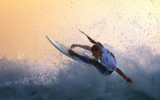 Surfer riding wave ocean sunset 4 - graceful free wallpaper