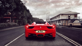 Red sports car cityscape cloudy - outrun free wallpaper