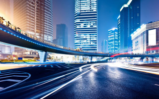 Futuristic cityscape bridge light streaks - a bridge and buildings free wallpaper