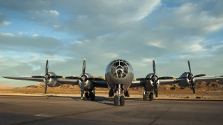 Propeller plane mountains clouds dusk - top of an airport runway free wallpaper