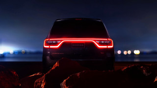 Car rocky beach night city - ambient lighting free wallpaper