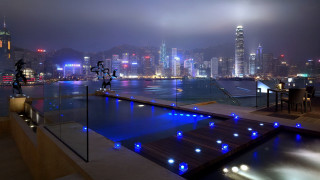 Large pool city skyline night - arthur pan free wallpaper