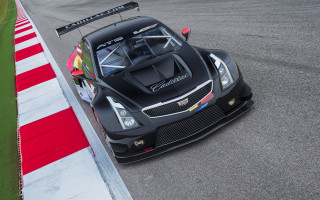 Black sports car raceflag vroom - a race track free wallpaper