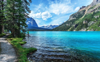 Man lake mountains bridge nature - blue water free wallpaper