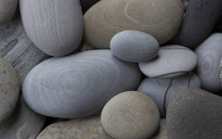 Pile rocks circular design grey - a pile of rocks free wallpaper
