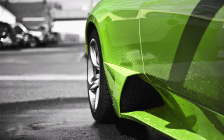 Green sports car street background - the background and a building in the background free wallpaper