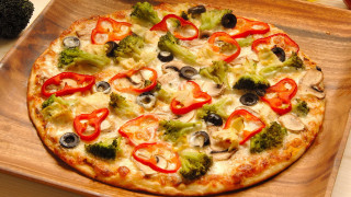 Pizza broccoli peppers mushrooms wooden - a wooden board free wallpaper