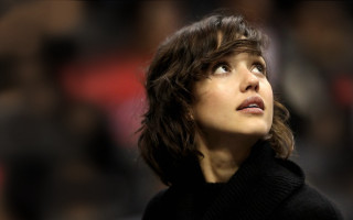 Woman looking up black sweater - a black sweater free wallpaper