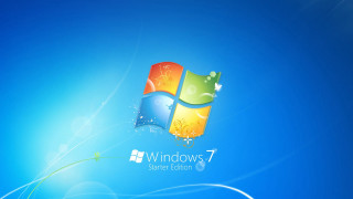 Blue background windows7 logo green 3 - a window 7 logo free wallpaper for desktop