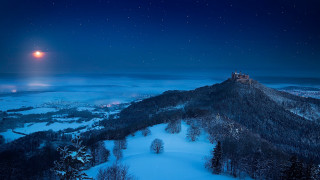 Castle mountain night fullmoon snowy - a full moon in the sky above free wallpaper for desktop
