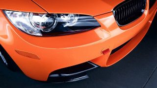 Bright orange car headlights grills - a close up free wallpaper for desktop