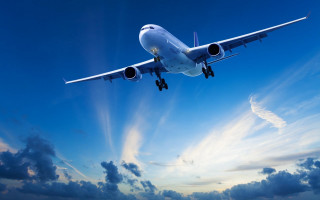 Large jetliner blue cloudy sky 3 - a blue cloudy sky free wallpaper