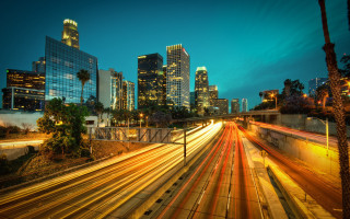 City skyline freeway night lights - traffic free wallpaper