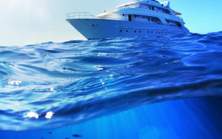 Large white boat ocean sun - shining free wallpaper