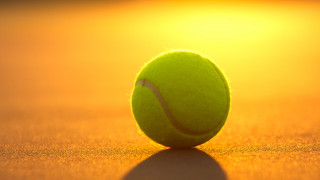 Tennis ball tennis court sunset - the sun shining behind free wallpaper