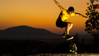 Man jumping skateboard watching autumn - a skateboard free wallpaper for desktop