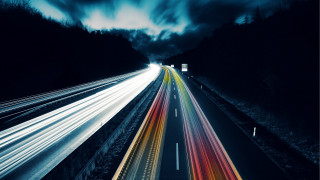 Highway long exposure cloudy night - a few car free wallpaper
