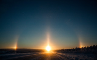 Sunlight snowy road trees lake - free light wallpaper