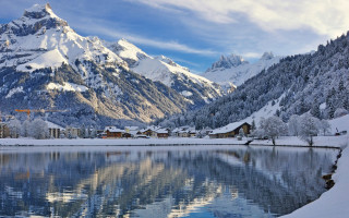 Mountain lake cityscape snowy sky - beautiful scenery free wallpaper for desktop