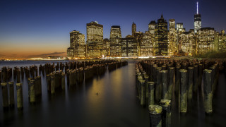 City skyline night water dock - a dock in the foreground free wallpaper