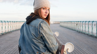 Woman denim jacket skateboard ocean - a skateboard free wallpaper for desktop
