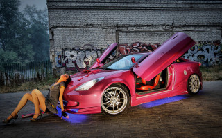 Woman sitting red sports car 3 - the door open free wallpaper